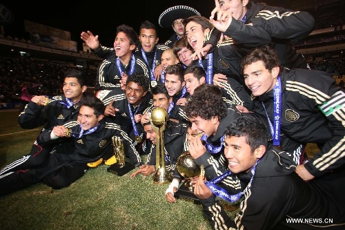 Mexico's players celebrate after the awarding ceremony of CONCACAF Under-20 Championship Grand Final soccer match against U.S., held at Cuauhtemoc Stadium in Puebla, Mexico on March 3, 2013. (Xinhua/Straffonimages) 