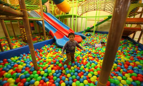 A boy plays at Omocha Toys Kingdom. Photo: Cai Xianmin/GT