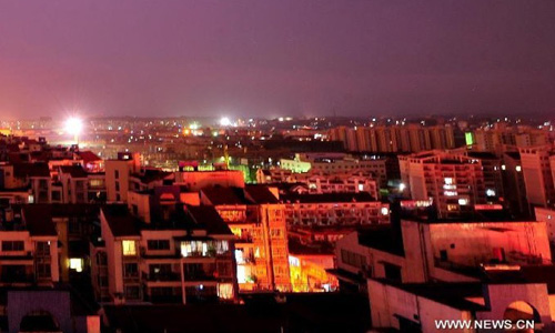 Photo taken on August 17, 2012 shows lightning above buildings as Typhoon Kai-Tak approaches in Nanning City, capital of south China's Guangxi Zhuang Autonomous Region. Kai-Tak is forecast to make landfall in coastal regions of south China's Guangdong Province at noon or during the morning of Friday, bringing heavy rain and gales to the country's southern parts, according to China Meteorological Administration (CMA). Photo: Xinhua