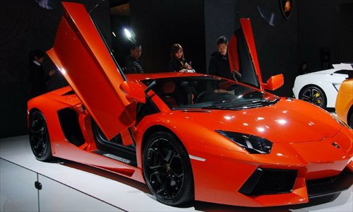 A Lamborghini is shown at the 10th China (Guangzhou) International Automobile Exhibition in Guangzhou, capital of south China's Guangdong Province, December 2, 2012. The ten-day auto show, which kicked off on Nov. 23, 2012, closed on Sunday. Photo: Xinhua