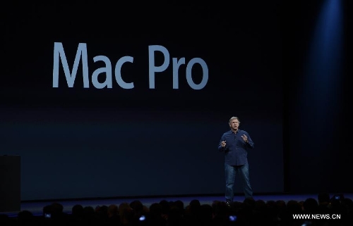 Apple Senior Vice President of Worldwide product marketing, Phil Schiller, addresses the 2013 Apple WWDC at the Moscone Center in San Francisco, California, the United States, on June 10, 2013. (Xinhua) 