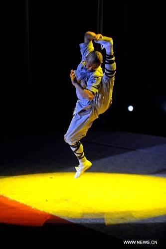 A performer of the Yandong Shaolin Kungfu troupe shows 