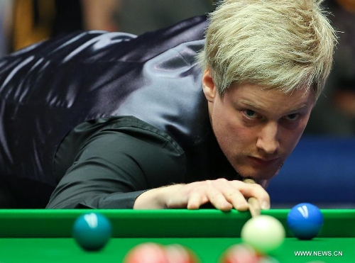 Neil Robertson of Australia competes during the Masters Snooker final against England's Mark Selby in London, Britain, Jan. 20, 2013. (Xinhua/Yin Gang) 