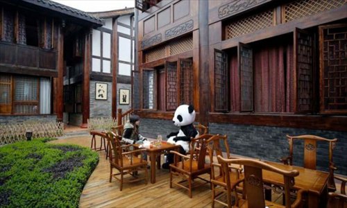 The first panda-themed hotel in the world was opened Tuesday at the foot of Mount Emei in Sichuan Province. Pandas are everywhere from sculptures and paintings to room motifs.Photos: Chinanews.com