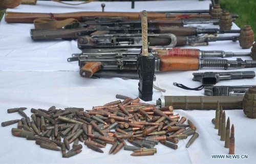 Taliban weapons seizing in an operation by Afghan police are displayed in Jawzjan Province, Afghanistan, on April 1, 2013. (Xinhua/Arui)