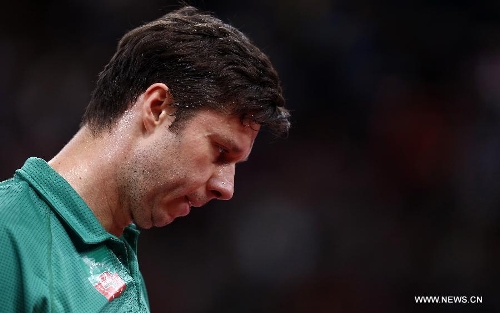 Vladimir Samsonov of Belarus reacts during men&#39;s singles round of 16 against Matsudaira Kenta of Japan at the 2013 World Table Tennis Championships in Paris ... - 9914a8d3-fe78-444c-963a-c9e9d8c1e6bc