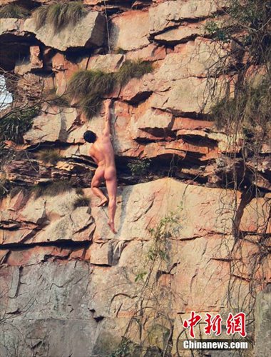 Naked ‘Spiderman’ scales 100-meter peak - Global Times