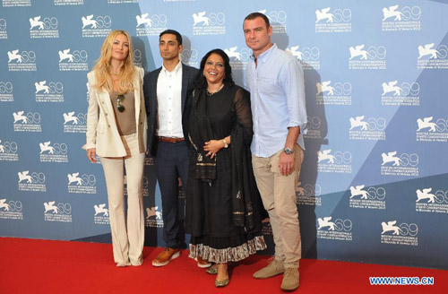 Indian director Mira Nair(2nd R) and cast members pose for photos at the photocall of the opening film 