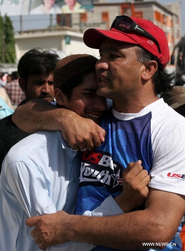 Pakistanis mourn for the death of Sadiq Zaman Khattak, candidate for a National Assembly seat of the ethnic Pashtoon 