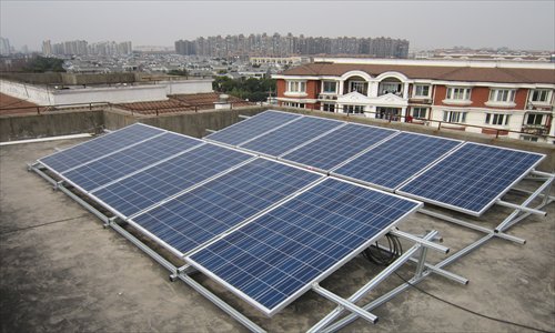 The solar panels installed on the roof of the building where Dang Jihu lives in Songjiang district Photo: CFP