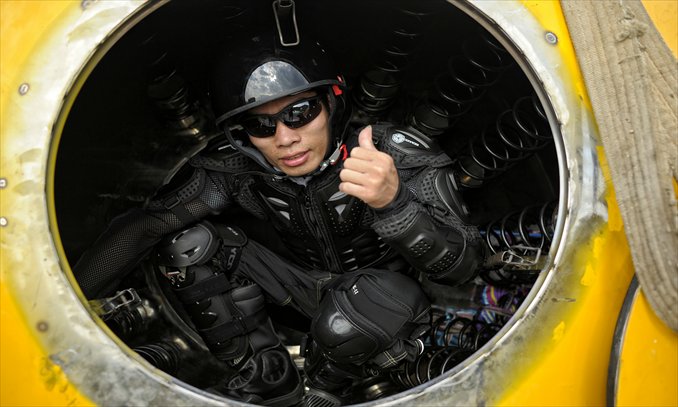 Yang Zongfu poses for a photo in the ark's hatch. Photo: Courtesy of Yang Zongfu