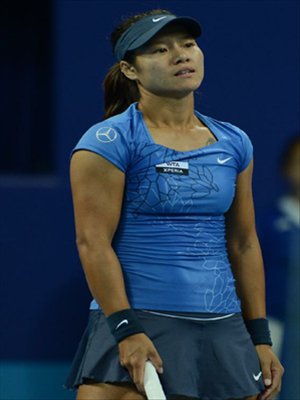 Li Na of China reacts during the women's singles 3rd round against Peng Shuai of China at the China Open tennis tournament in Beijing China, on October. 4, 2012.  Photo: Xinhua