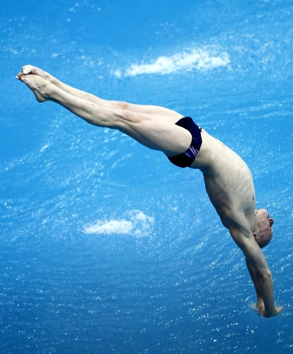 Ilya Zakharov of Russia competes during the men's 3m springboard semifinal B at the FINA Diving World Series 2013 held at the Aquatics Center, in Beijing, capital of China, on March 16, 2013. Ilya Zakharov enter the final with 496.70 points. (Xinhua/Bi Mingming) 