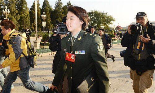 Jiao Liuyang, a delegate of the 18th National Congress of the Communist Party of China (CPC), arrives to attend the 18th CPC National Congress at the Great Hall of the People in Beijing, capital of China, November 8, 2012. The 18th CPC National Congress will be opened in Beijing on Thursday morning. Photo: Xinhua