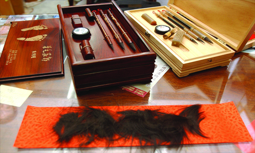 A set of calligraphy brushes made of a baby's hair. 
