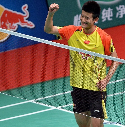 China's Chen Long celebrates after winning the men's singles match against South Korea's Lee Dong Keun at the finals of the Sudirman Cup World Team Badminton Championships in Kuala Lumpur, Malaysia, on May 26, 2013. Chen Long won 2-0. (Xinhua/Chen Xiaowei) 