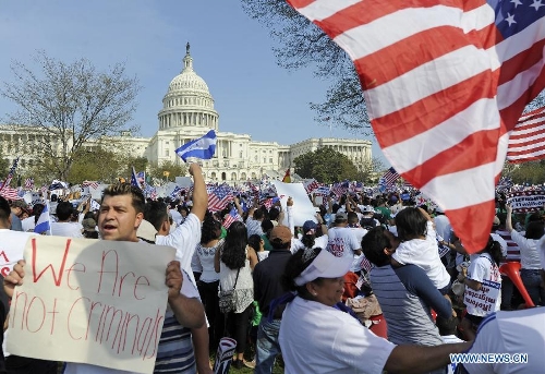 Immigration reform supporters demonstrate in the 