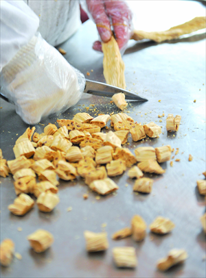 Pieces of candied ginger. 
