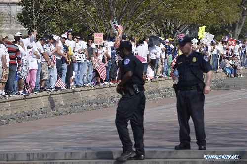 Immigration reform supporters demonstrate in the 