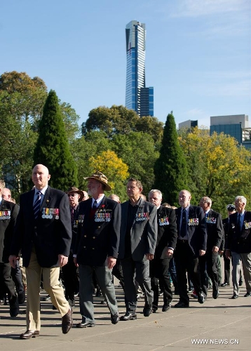 War veterans attend the service marking the Anzac Day at the Shrine of Remembrance in Melbourne, Australia, April 25, 2013. Anzac Day is a national day of remembrance in Australia and New Zealand, originally to honor the members of the Australian and New Zealand Army Corps (ANZAC) who fought at Gallipoli during World War I and now more to commemorate all those who served and died in military operations for their countries. (Xinhua/Bai Xue)