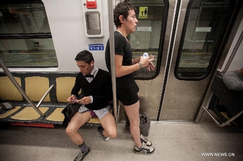 People without their pants take part in the worldwide 