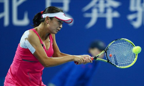 Peng Shuai of China returns the ball during the women's singles 3rd round against Li Na of China at the China Open tennis tournament in Beijing China, on October. 4, 2012.  Photo: Xinhua