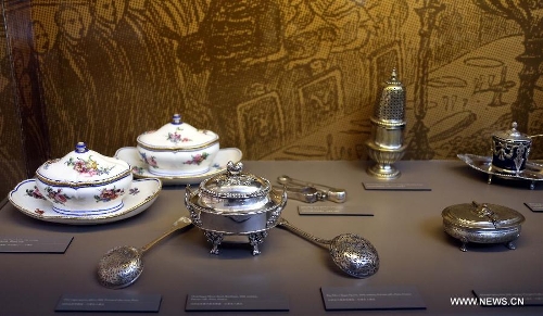 Photo taken on May 4, 2013 shows a set of classic tableware displayed in an exhibition of 