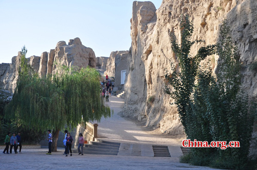 The Ancient City of Jiaohe, also known as Ancient City on Ya'er Lake, is an ancient Chinese archaeological site found in the Yarnaz Valley, 10 km west of the city of Turpan, Xinjiang province. It was a prefecture of the Gaochang during the Sixteen States (304AD-439 AD) and a county of the Gaochang Prefecture after the 14th year (640 AD) of the Zhenguan reign during the Tang Dynasty. Photo: Xinhua