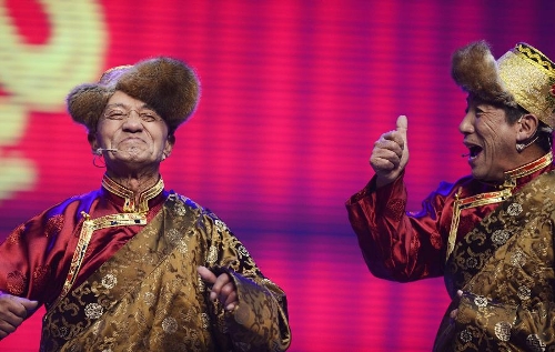 Crosstalk comedians perform during a rehearsal for the Tibetan New Year or Losar TV show in Lhasa, capital of southwest China's Tibet Autonomous Region, Jan. 27, 2013. Losar, the most important festival of the Tibetan ethnic group, falls on Feb. 11 this year. (Xinhua/Purbu Zhaxi) 