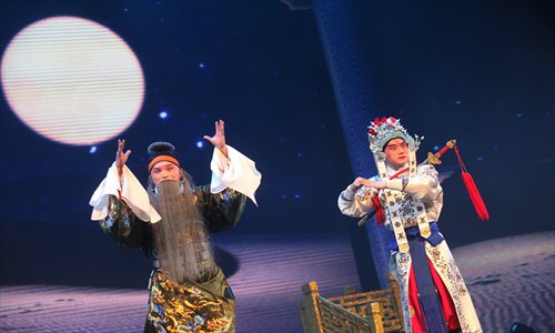 Peking Opera actors perform to commemorate Zhou Xinfang, the legendary master of the art form. Photo: CFP