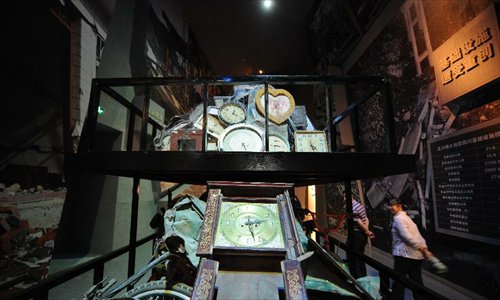 People visit the Wenchuan Earthquake Memorial Museum in the town of Qushan, Beichuan Qiang Autonomous County, southwest China's Sichuan Province, May 9, 2013. The museum was officially opened to the public for free on Thursday to commemorate the fifth anniversary of the Wenchuan earthquake, which hit Sichuan on May 12, 2008 and left more than 87,000 people dead or missing. (Xinhua/Xue Yubin) 