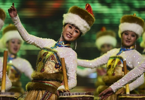 Actress perform a Tibetan dance during a rehearsal for the Tibetan New Year or Losar TV show in Lhasa, capital of southwest China's Tibet Autonomous Region, Jan. 27, 2013. Losar, the most important festival of the Tibetan ethnic group, falls on Feb. 11 this year. (Xinhua/Purbu Zhaxi) 