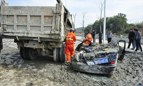 Woman rescued from smashed car in cement truck crash - Global Times