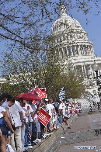 Immigration reform supporters demonstrate in the 