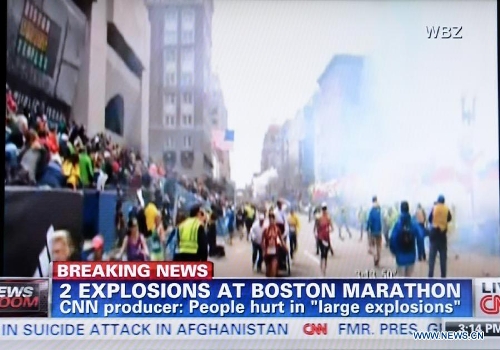 Video grab of CNN taken on April 15, 2013 shows explosions happened in Boston, the United States. Two explosions occurred near the Boston Marathon finish line, at least 6 people injured, local media reported. (Xinhua/Wang Lei) Related:At least 2 dead, 28 injured in Boston Marathon explosionsWASHINGTON, April 15 (Xinhua) -- At least two were dead, 28 injured in two explosions taking place near the Boston Marathon finish line on Monday afternoon, media here reported.President Barack Obama has been notified of the incident in Boston, a White House official told White House pool media. Full storyBoston police confirms third explosion at JFK LibraryWASHINGTON, April 15 (Xinhua) -- Police said on Monday that a third explosion hit the Boston JFK Library, but it remains unclear whether it was related to the previous two blasts near the finish line of the Boston marathon.