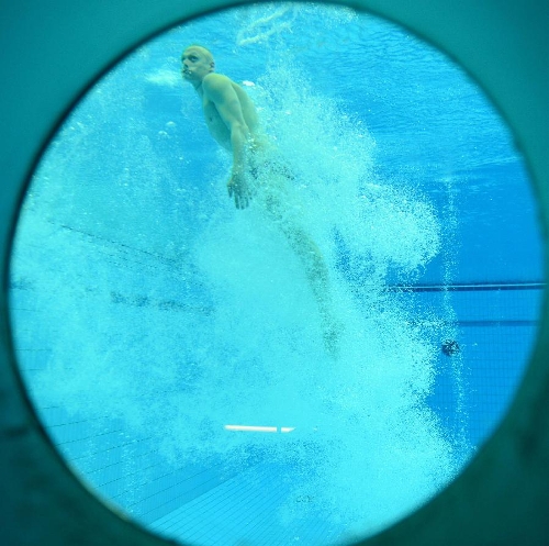 Ilya Zakharov of Russia competes during the men's 3m springboard final at the FINA Diving World Series 2013 held at the Aquatics Center, in Beijing, capital of China, on March 16, 2013. Ilya Zakharov took the third place with 514.45 points. (Xinhua/Guo Yong)