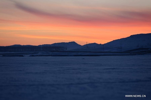 Photo taken on Jan. 8, 2013 shows the beautiful scenery of Qagan Gol Town in Qinghe County, northwest China's Xinjiang Uygur Autonomous Region. (Xinhua/Sadat)  