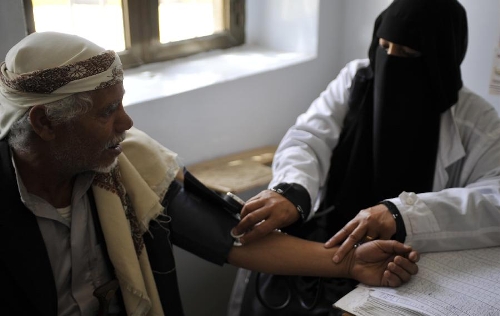 A Yemeni doctor measures a patient's blood preasure at a medical center in Sanaa, Yemen, on April 7, 2013. The World Health Day is celebrated on April 7 to mark the 65th anniversary of the World Health Organization that was established in 1948. The theme for 2013 is high blood pressure. The Yemeni government has been trying to restore medical services in the country after the unrest in 2011 hit hard the cash-stripped Arab state. (Xinhua/Mohammed Mohammed) 