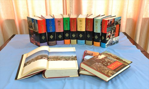 Some of the books compiled by Shanghai district level records offices. Photo: Courtesy of Ding Xi/Office of Shanghai Chronicles