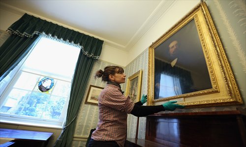 Final touches are made to the interior of Charles Dickens' London home.