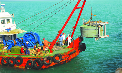 A crane ship at work.
