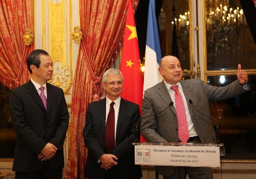 Jean-Marie Le Guen (R), chairman of the France-China Friendship Group of France's National Assembly, addresses a Chinese lunar New Year reception at the residence of the speaker of France's National Assembly in Paris, capital of France, on Feb. 5, 2013. The Chinese Embassy to France and the France-China Friendship Group of France's National Assembly held the reception here on Tuesday to greet the upcoming Chinese lunar New Year, which falls on Feb. 10 this year. (Xinhua/Gao Jing) 