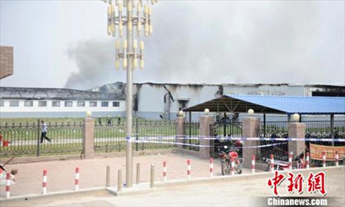 Photo taken on June 3, 2013 shows the accident site after a fire occurred at the Jilin Baoyuanfeng Poultry Company in Mishazi Township of Dehui City, Northeast China's Jilin Province. At least 43 people were killed on Monday morning in the poultry processing plant fire. (Xinhua/Wang Haofei)