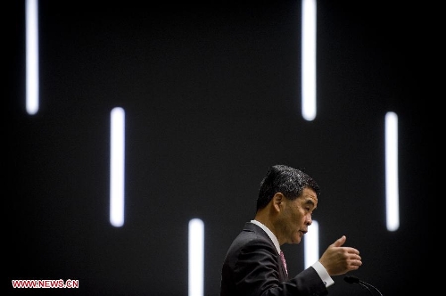  Hong Kong Chief Executive Leung Chun-Ying speaks to Journalist at a press conference after he delivered his 2013 Policy Address in Hong Kong, south China, Jan. 16, 2013. Leung delivered his first policy address on Wednesday morning at the Legislative Council here, outlining the city government's policy direction in 2013. (Xinhua/Lui Siu Wai)