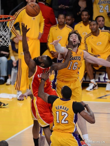 James Harden of the Houston Rockets goes to basket during the NBA game against Los Angeles Lakers in Los Angeles, on April 17, 2013. The Lakers won 99-95. (Xinhua/Yang Lei) 