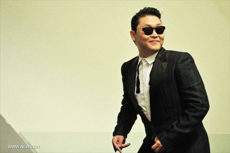 South Korean pop singer Psy attends a press conference before his performance in Singapore , December 1, 2012. (Xinhua/Then Chih Wey)


