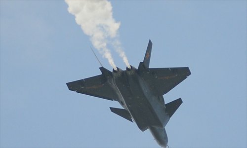 China conducted another test flight of its J-20 stealth flighter, number 2001, on Saturday. Photo: mil.huanqiu.com