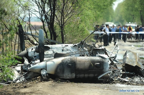 Photo taken on May 16, 2013 shows the remains of a light plane after it failed to take off at Taoxian Airport in Shenyang, capital of northeast China's Liaoning Province. Three people on board were injured in the accident on Thursday. (Xinhua/Pan Yulong) Related:Three injured in plane's failed take-off in NE ChinaSHENYANG, May 16 (Xinhua) -- Three people on board a light plane were injured in the aircraft's aborted take-off at an airport in Shenyang, capital of northeast China's Liaoning Province, Thursday morning, the airport sources said.The injured have been rushed to hospital.  Full story