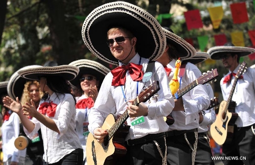 Actors from Mexico perform at a carnival during the China Kunming Culture and Tourism Festival in Kunming, capital of southwest China's Yunnan Province, April 29, 2013. (Xinhua/Lin Yiguang) 