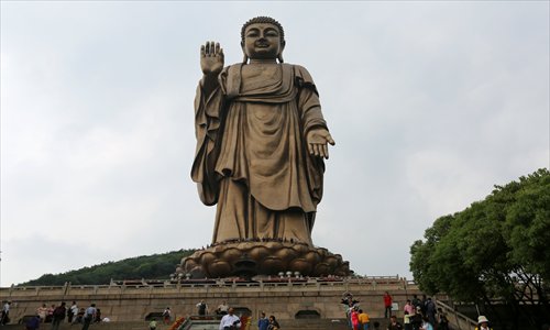 buddha waving